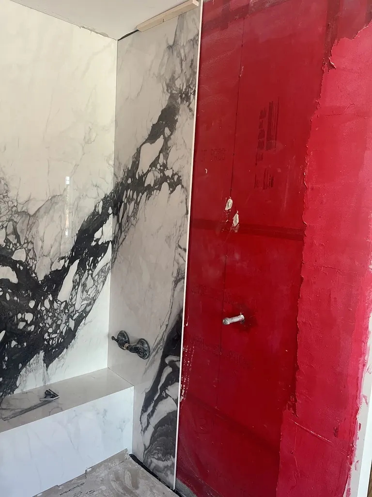 Panda marble shower slab wall installation in progress